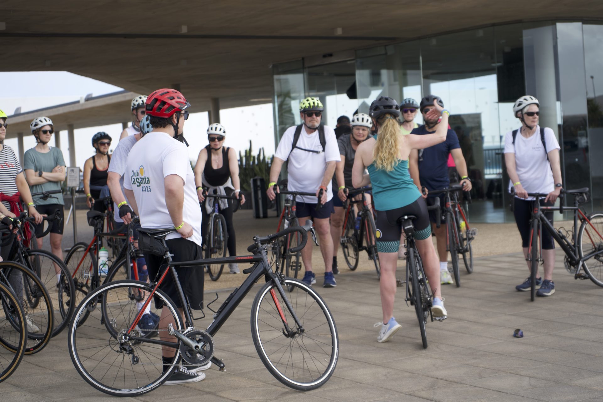 Participants standing with their bikes