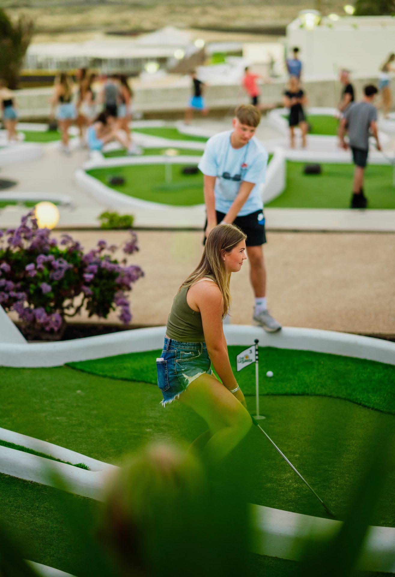 A school group playing mini golf at Club La Santa